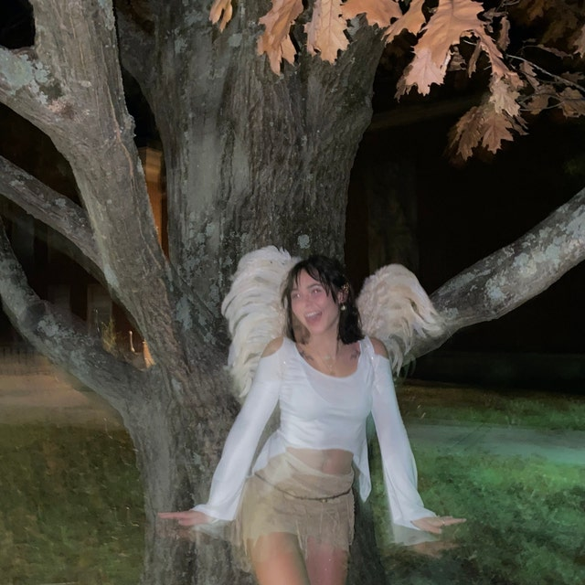 Girl flash evening tree