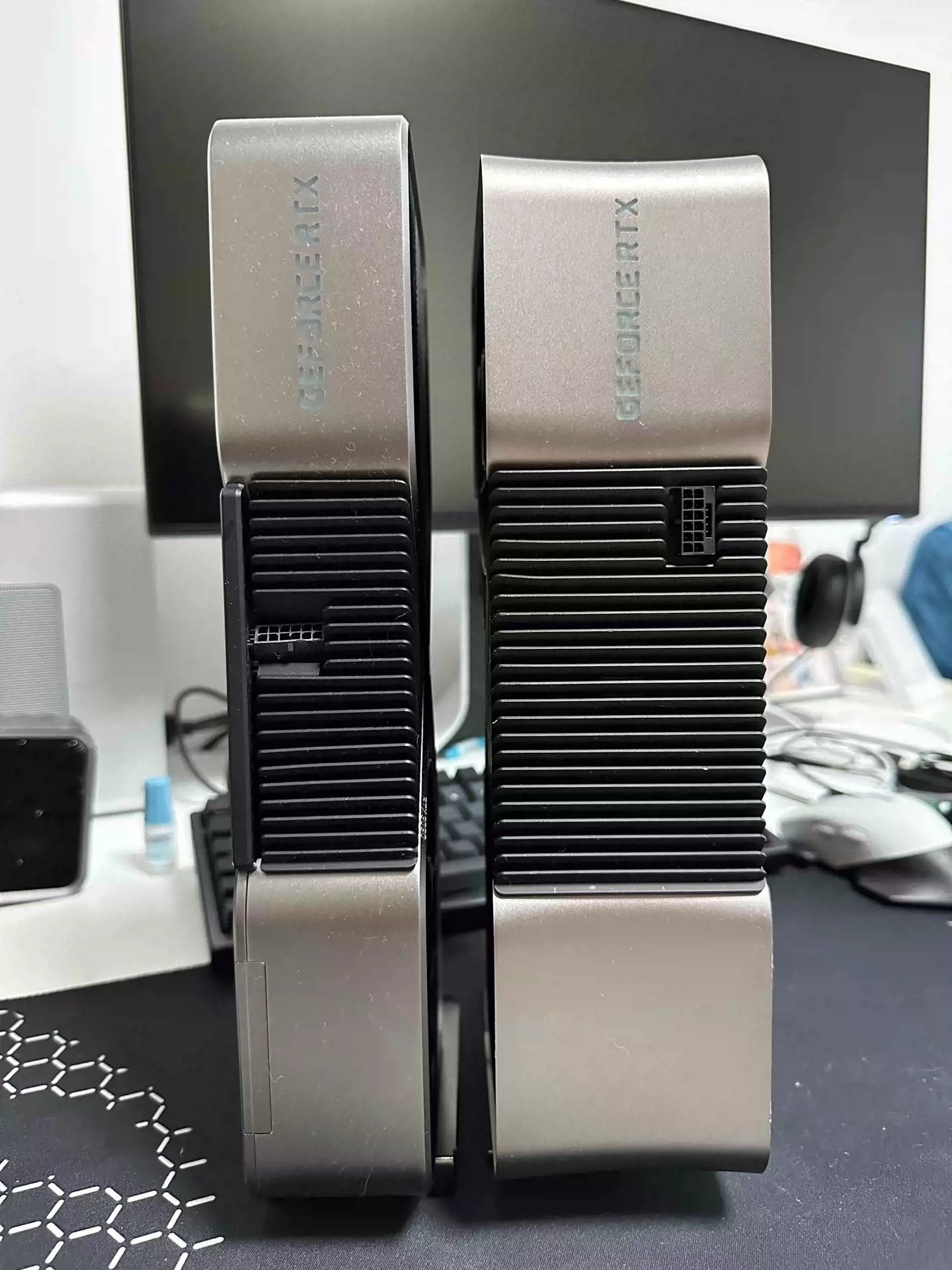 The graphics card on the left is an RTX 4090, whereas the graphics card on the dazzling is (allegedly) an early RTX 5090 prototype.