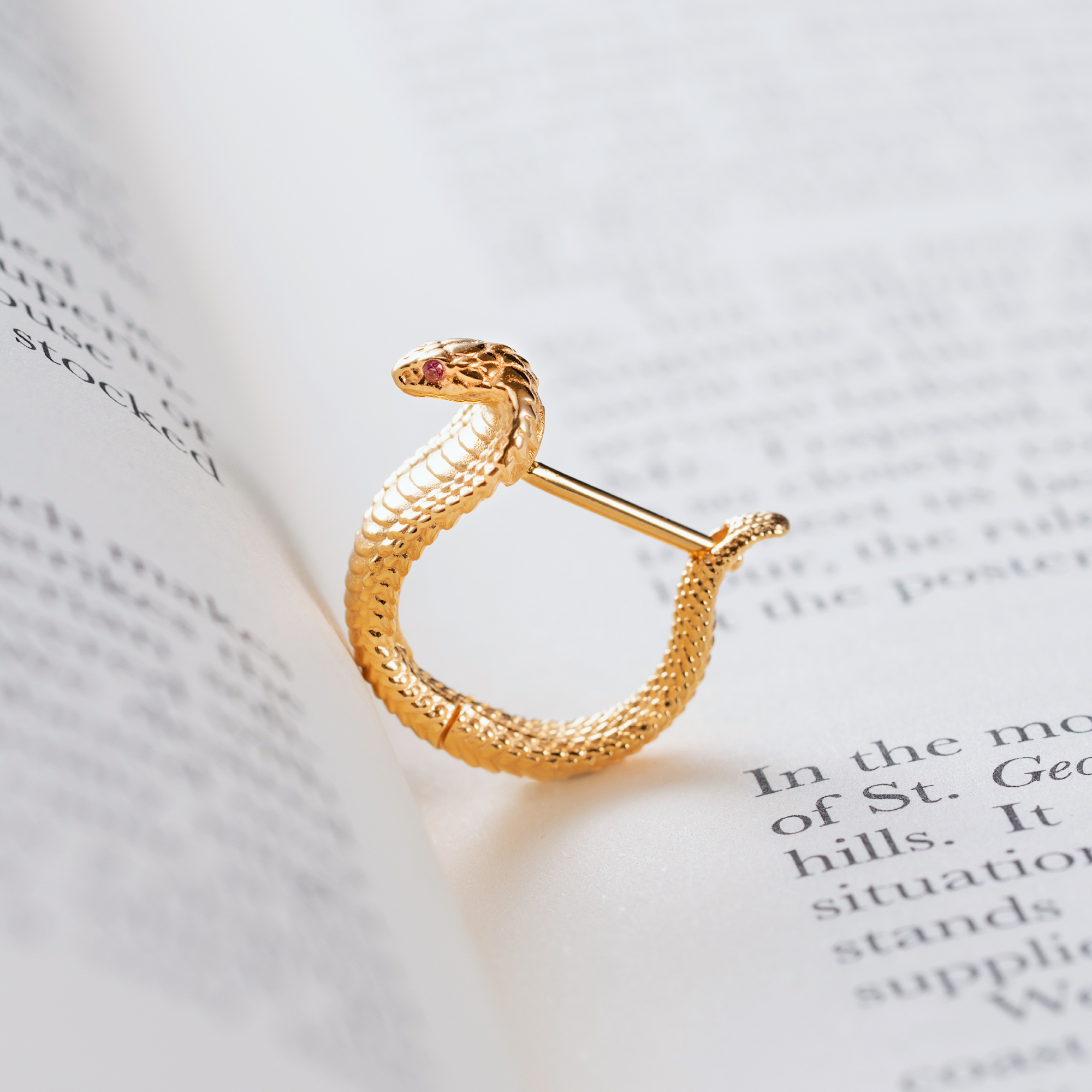 I designed a gold-plated cobra earring.
