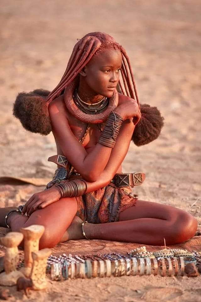A Himba woman selling bracelets, Namibia.