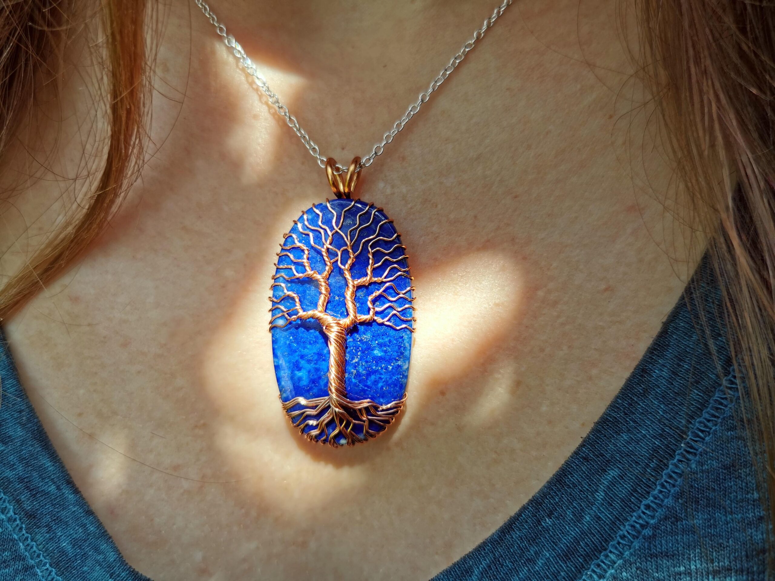 Here’s a lapis lazuli tree pendant I made. I frail about 5 meters of covered copper wire.