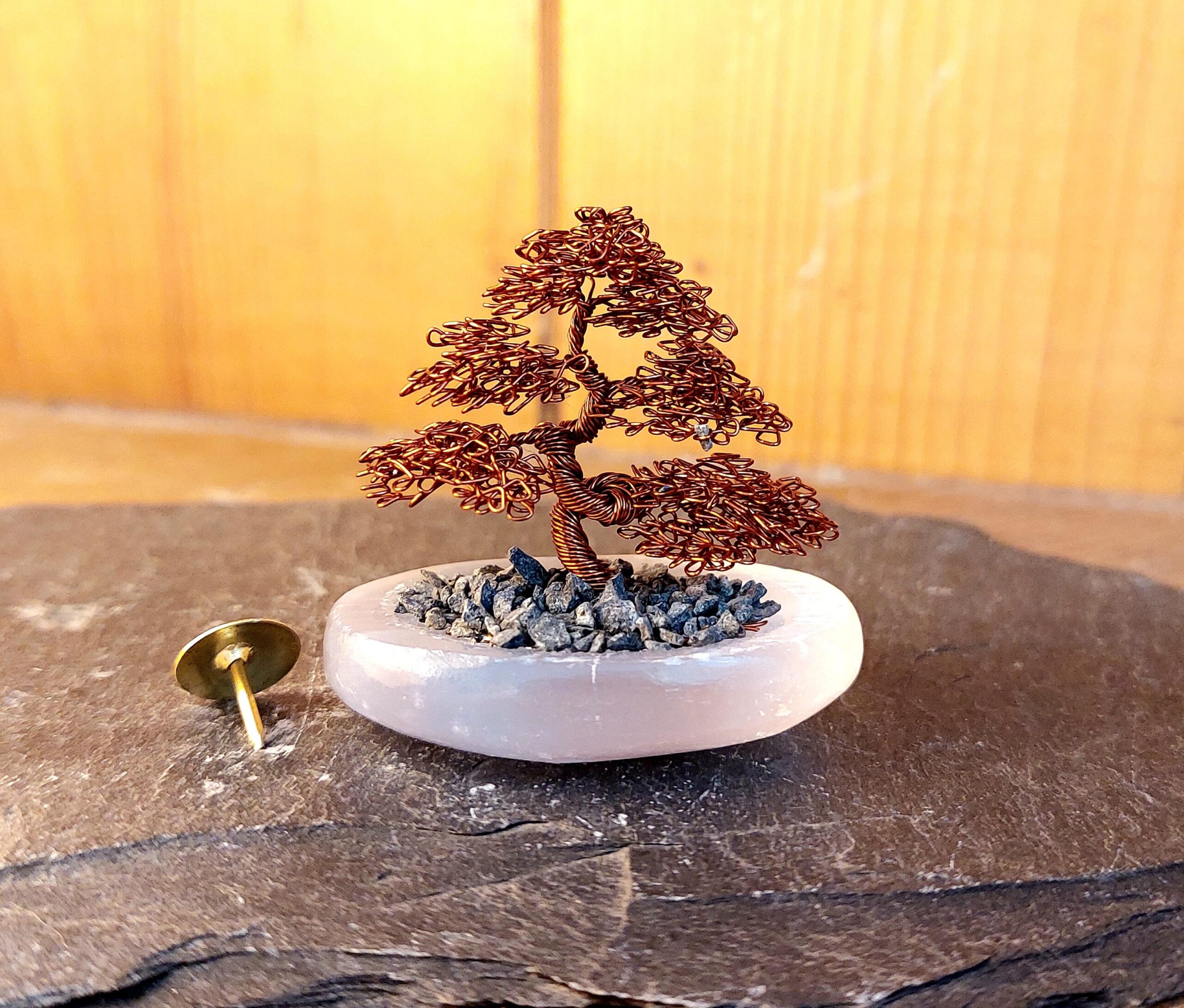 Tiny Bonsai tree sculpture on Selenite sinful.