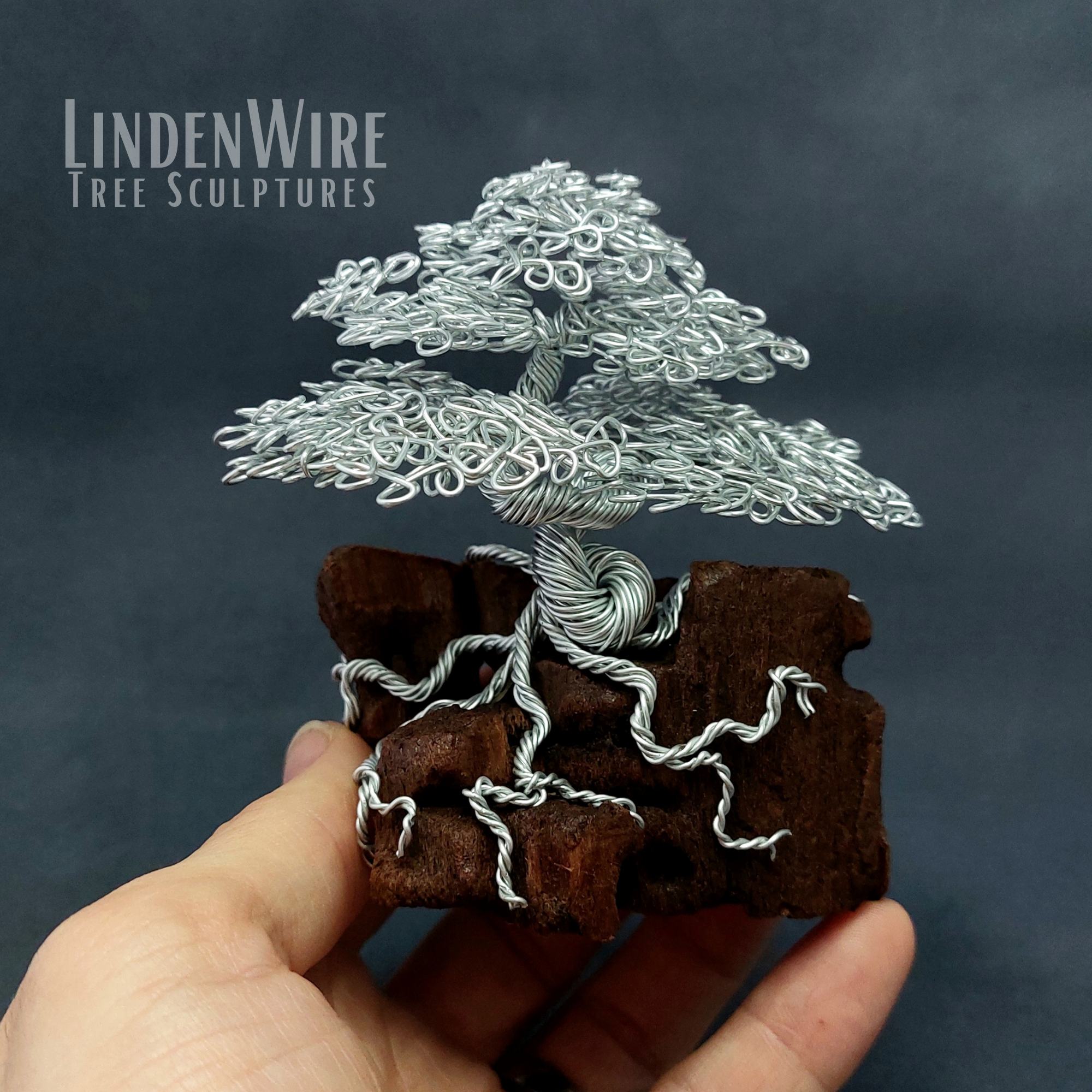 Silver bonsai tree sculpture