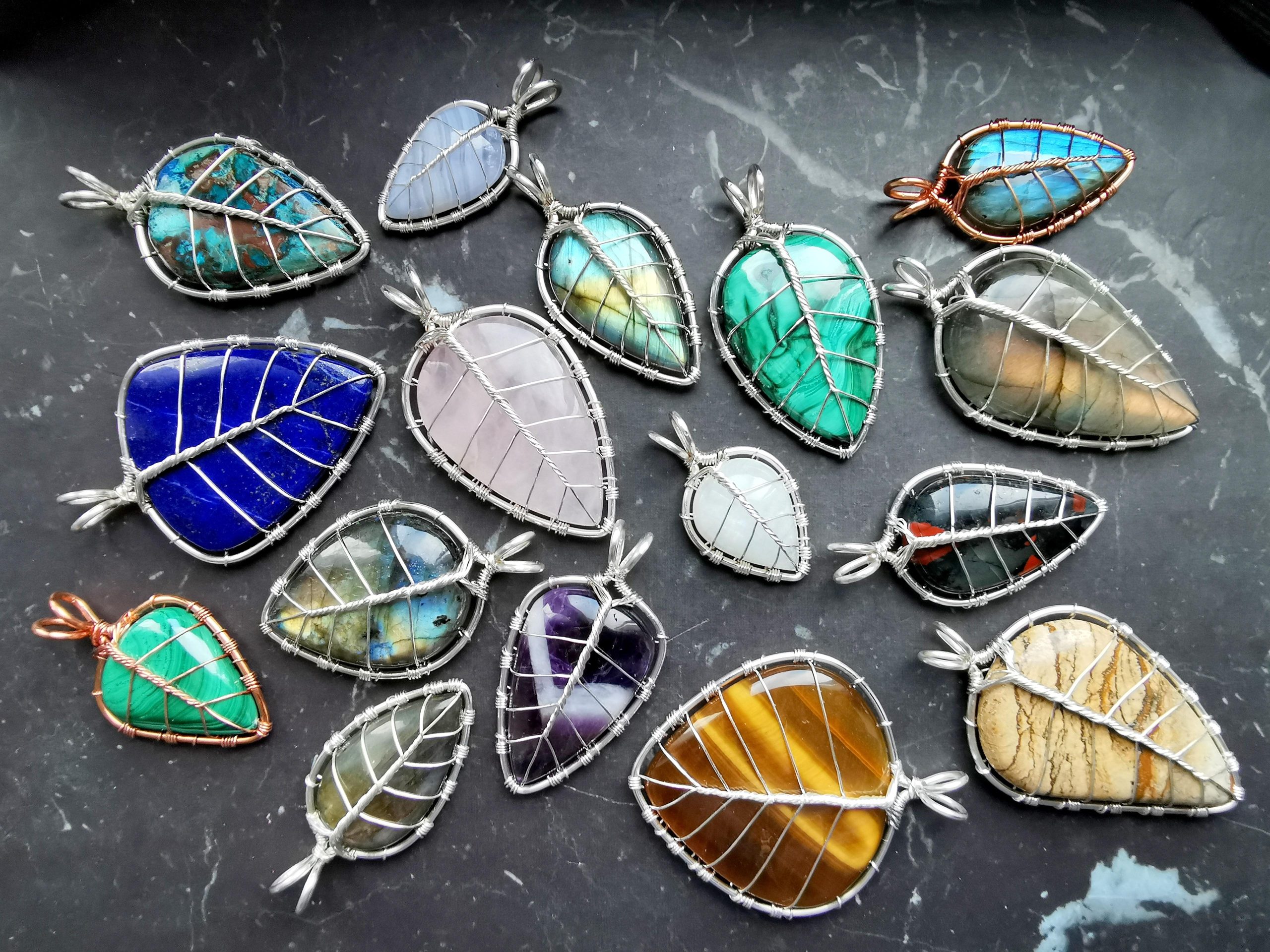 I made some leaf pendants with completely different gem stones.