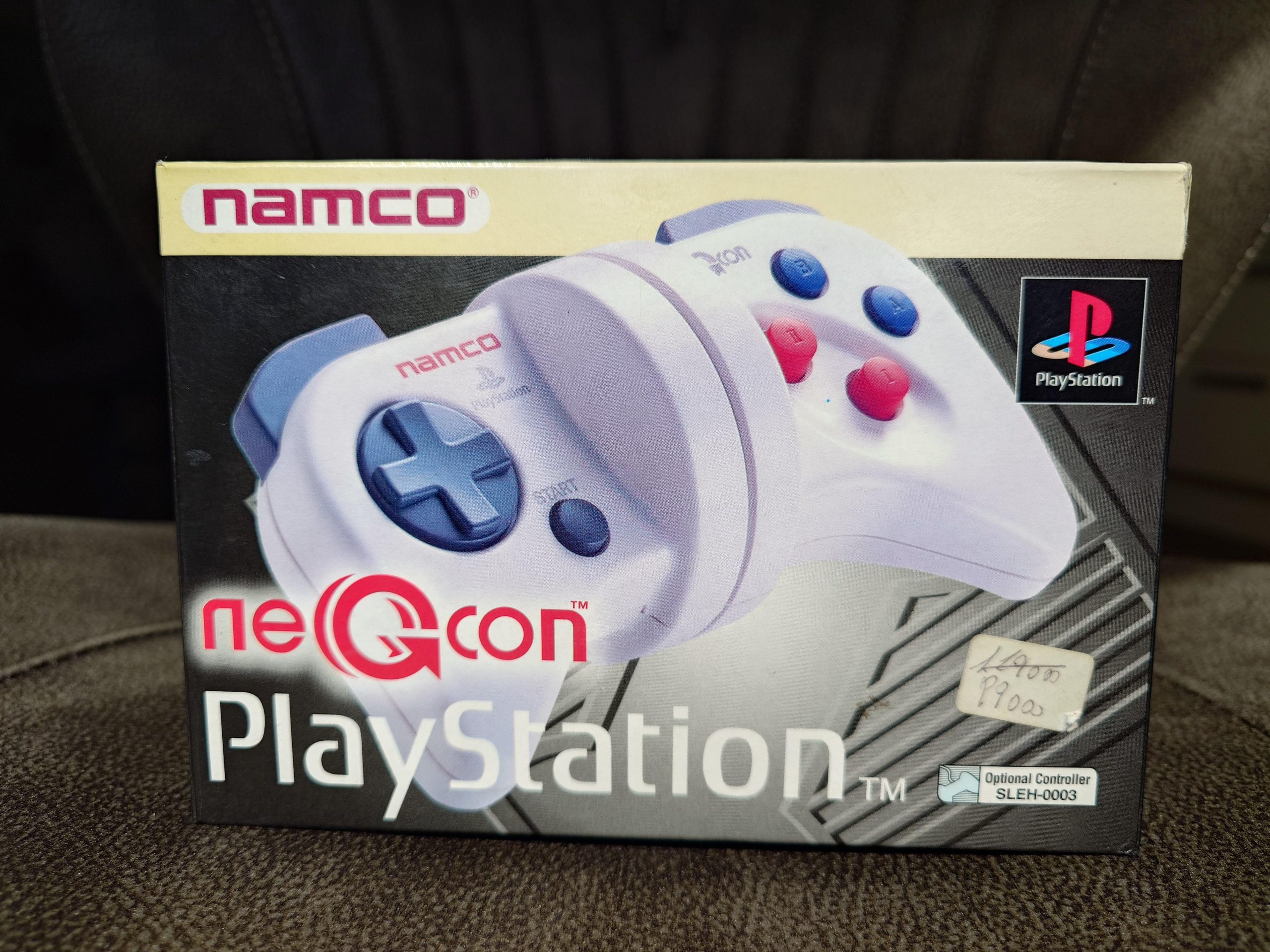 A sealed 90s Namco NeGcon controller. This legitimate first European yellow box model is rather rare!